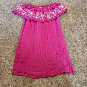 Girls off the shoulder dress with embroidered flower accents and pockets